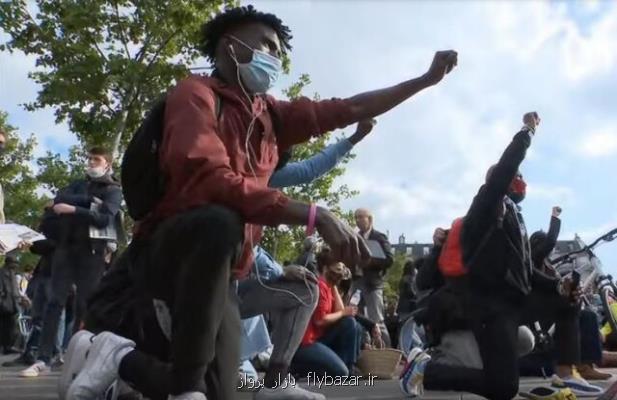 معترضان ضد نژادپرستی در پاریس به یاد فلوید زانو زدند